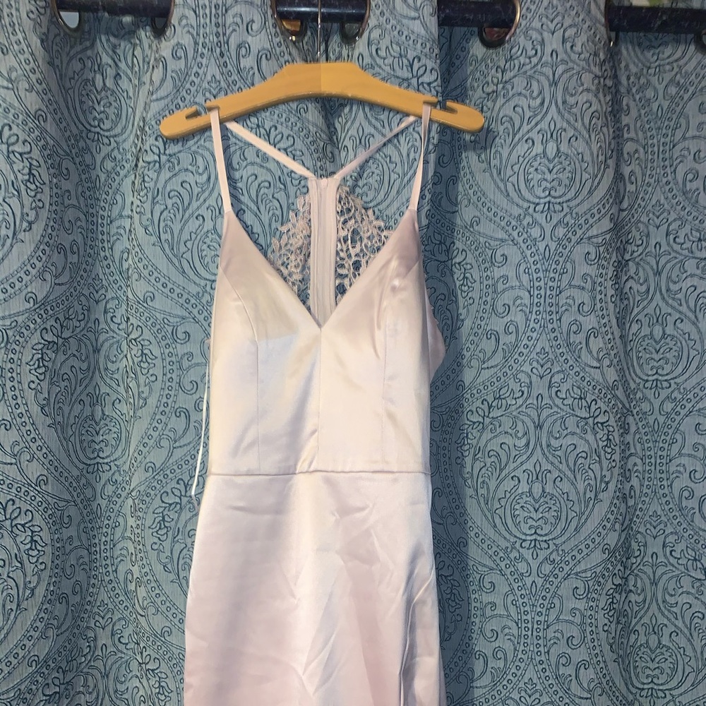 Rose gold dress with lace detailing on back